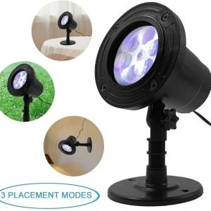 Christmas snowfall light projector creating a winter wonderland effect in a backyard