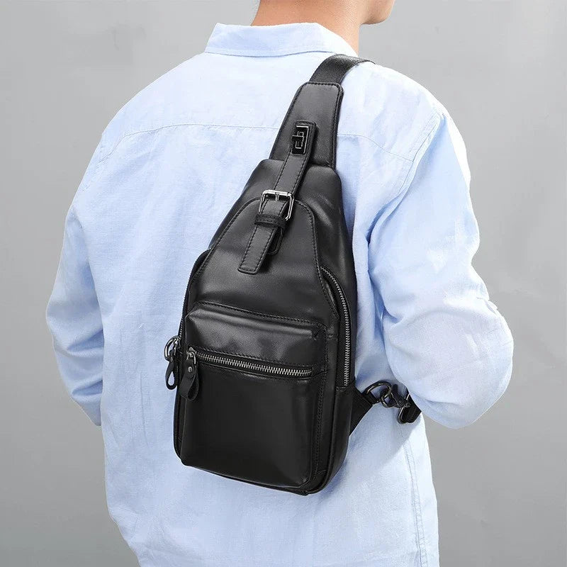 Men's leather chest bag crossbody in a sleek, vertical square design with multiple interior pockets for organized storage