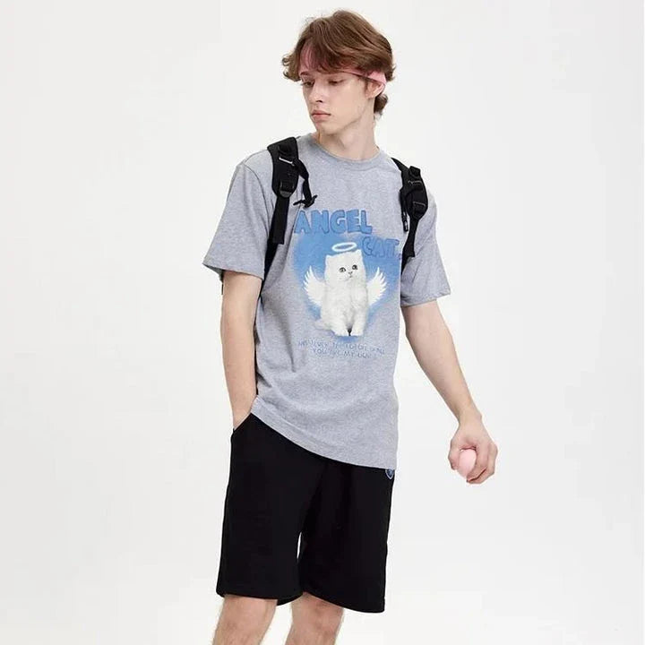 A unique angel cat graphic t-shirt in a relaxed, comfortable fit for everyday casual wear.