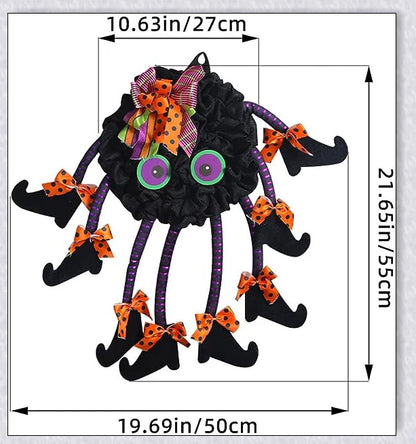 Spiri Halloween Multi-Legged Witch Wreath with orange, purple, and black colors, witch legs, striped boots, and Halloween ribbons