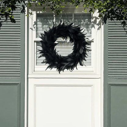 Black Halloween Feather Wreath with Hints of Green and Purple, Ideal for Spooky Decor