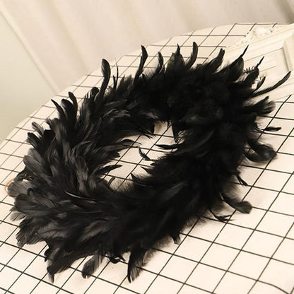 Black Halloween Feather Wreath with Hints of Green and Purple, Ideal for Spooky Decor