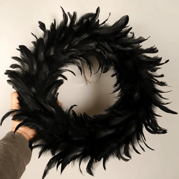 Black Halloween Feather Wreath with Hints of Green and Purple, Ideal for Spooky Decor
