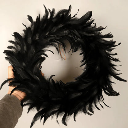 Black Halloween Feather Wreath with Hints of Green and Purple, Ideal for Spooky Decor