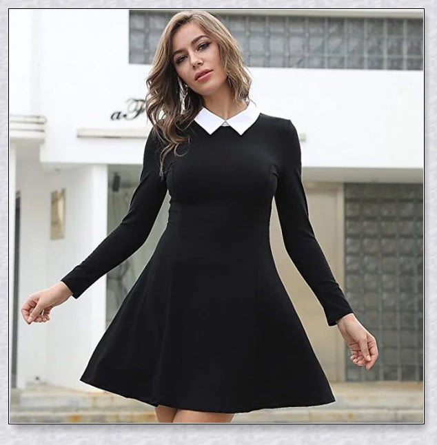 A vintage-inspired peter pan collar dress in various colors, perfect for channeling Ms. Frizzle from The Magic School Bus.