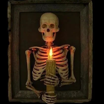 Life-size 3D haunted house skull Halloween decoration with pillar candles for a spooky, mystical ambiance