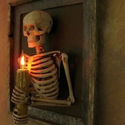 Life-size 3D haunted house skull Halloween decoration with pillar candles for a spooky, mystical ambiance