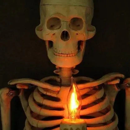 Life-size 3D haunted house skull Halloween decoration with pillar candles for a spooky, mystical ambiance