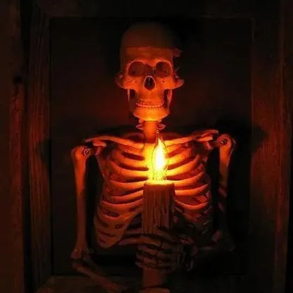 Life-size 3D haunted house skull Halloween decoration with pillar candles for a spooky, mystical ambiance