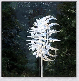 Mesmerizing metal kinetic sculpture with eighteen balanced blades rotating in opposite directions, creating a hypnotic visual display for your outdoor space