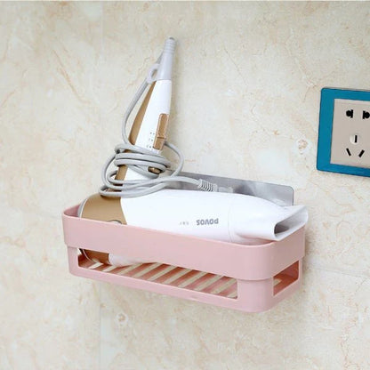 A modern, minimalist bathroom adhesive shelf made of stainless steel and tempered glass, providing storage and style