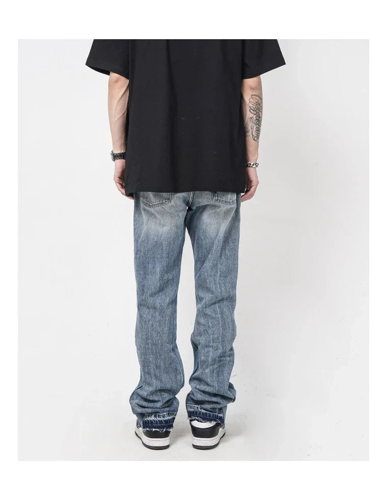 Men's straight-leg jeans with distressed detailing and a relaxed, comfortable fit