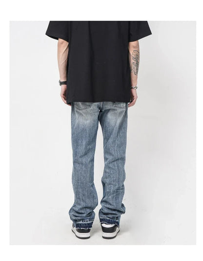 Men's straight-leg jeans with distressed detailing and a relaxed, comfortable fit