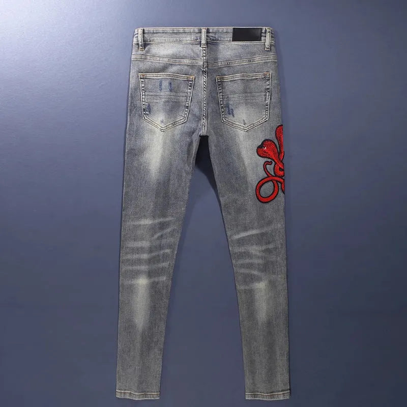 Men's Slim Fit Jeans with Worn Look Washed-Out Finish and Embroidered Patches, Mid Waist Zip Fly Trouser Style in Cotton Fabric Available in Sizes 28 to 38