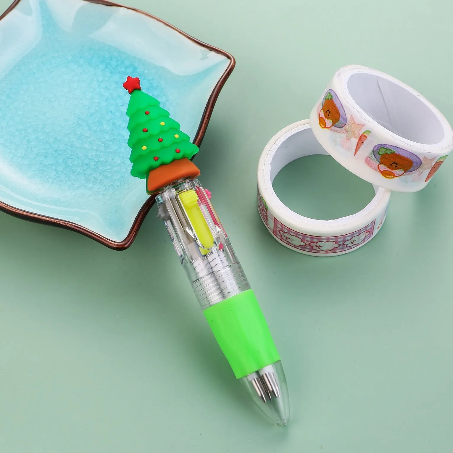 Christmas four-colour ballpoint pen with press mechanism showing festive designs