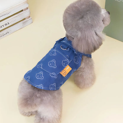 Teddy Bichon dog wearing denim princess dress with bracket skirt detailing