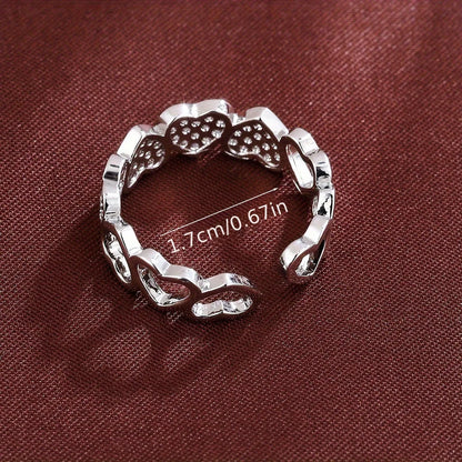 Adjustable opening couples ring with heart motif, gold and silver finishes, geometric shape, diamond treatment on copper