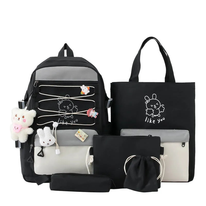 Nylon junior high school backpack in solid colour with curved shoulder straps and organisational compartments