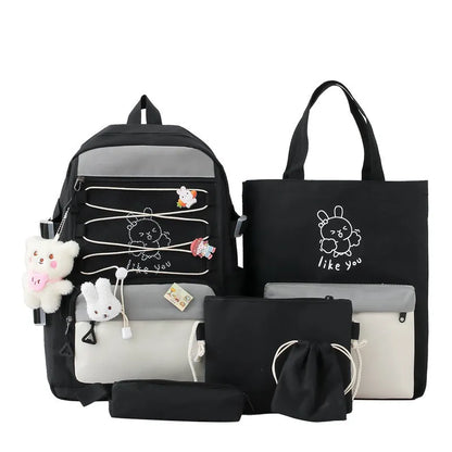 Nylon junior high school backpack in solid colour with curved shoulder straps and organisational compartments