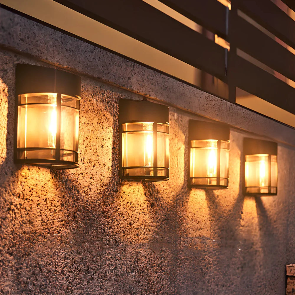 Solar outdoor wall light with warm glow, monocrystalline panel, and IP65 waterproof rating for garden use