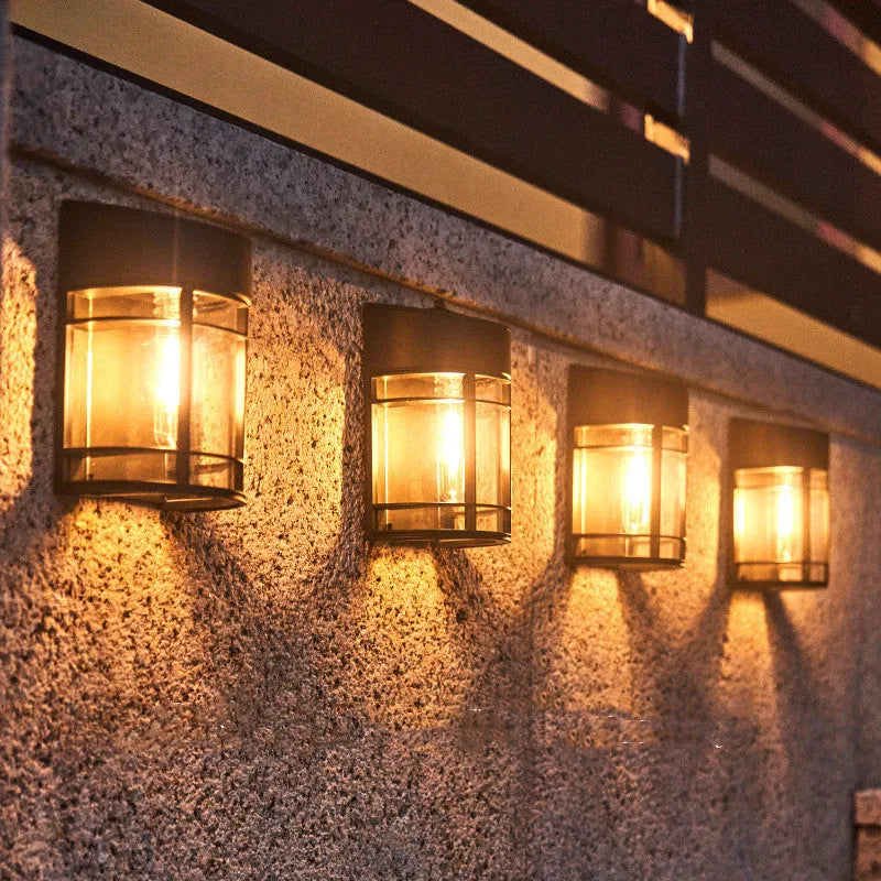 Solar outdoor wall light with warm illumination for garden and patio areas