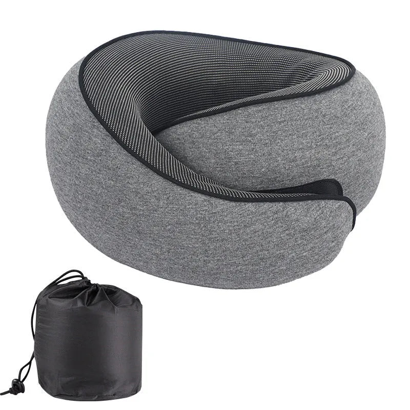 U-shaped grey memory foam travel neck pillow with storage bag.