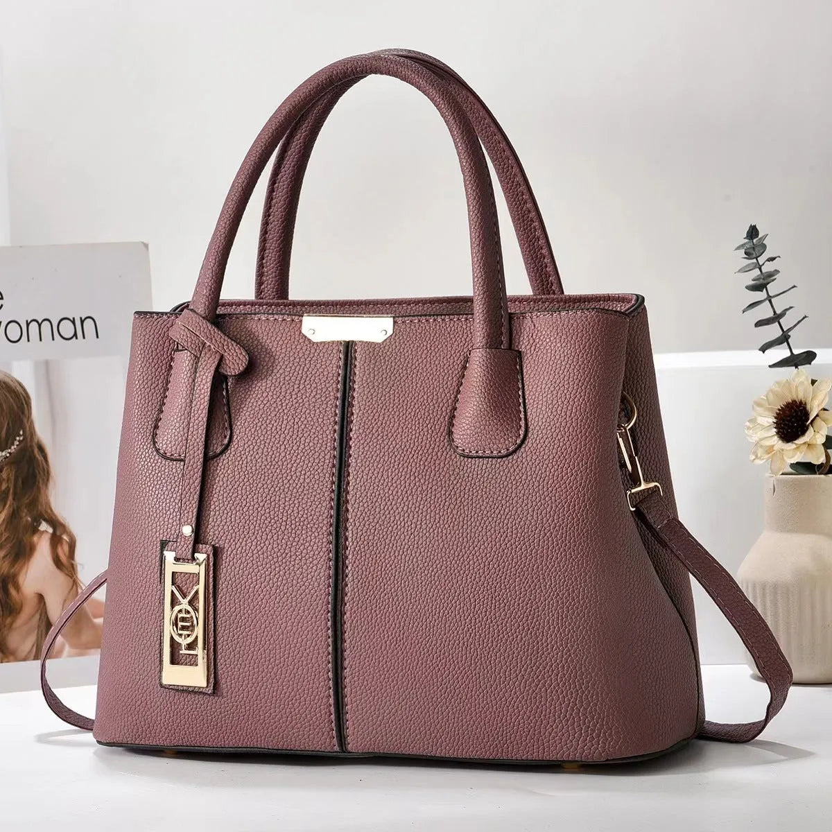 Soft PU leather large capacity shoulder bag in a horizontal square shape with an adjustable strap
