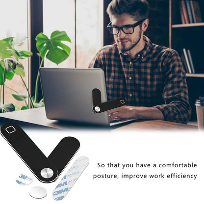 Black laptop phone holder with magnetic clip mounted on silver laptop, showing smartphone in adjustable bracket