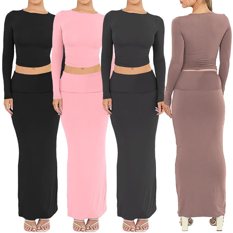 Women's two-piece suit in 100% polyester with a sweet style for autumn, featuring a sanded finish, a slim fit, and long skirt. Choose from XS, S, M, L, XL sizes in colours WX001 Black, Pink, Lotus Red, and Dark Grey.