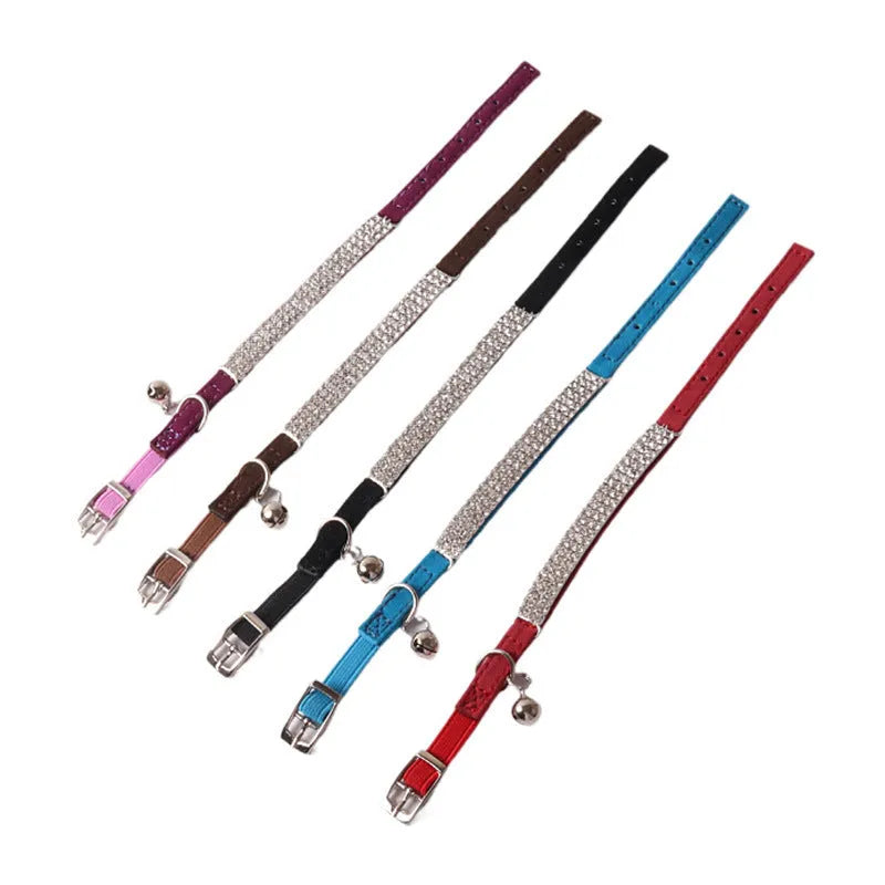 Cat collar with elastic buckle in six colour options showing 28cm length and flocking material texture