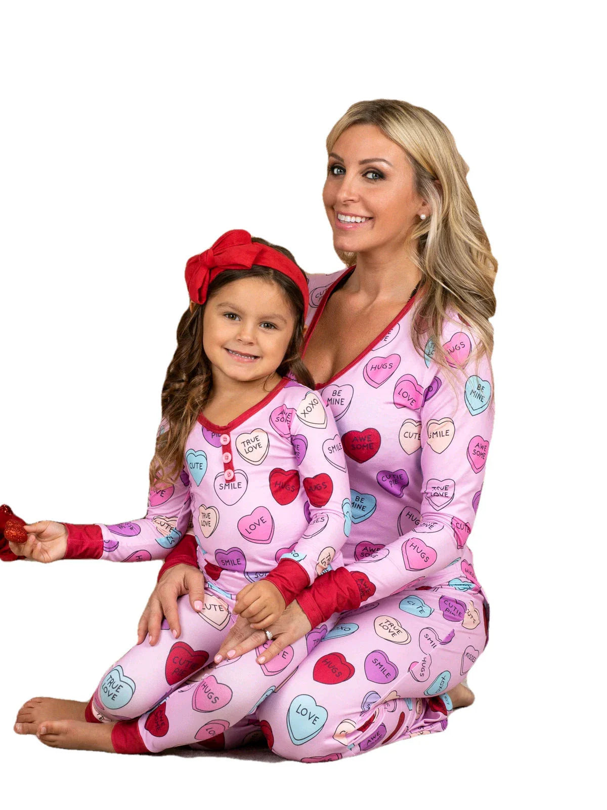 Cozy family matching Valentine's Day pajamas with heart-print design in cotton fabric
