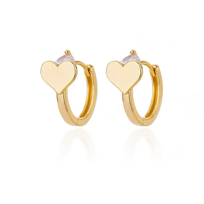 Gold-plated heart-shaped stud earrings with a simple zircon stone for women.