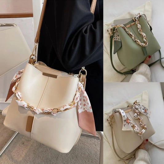 Women's crossbody bucket bag in white, Army Green, and light brown with spacious interior and durable PU material.