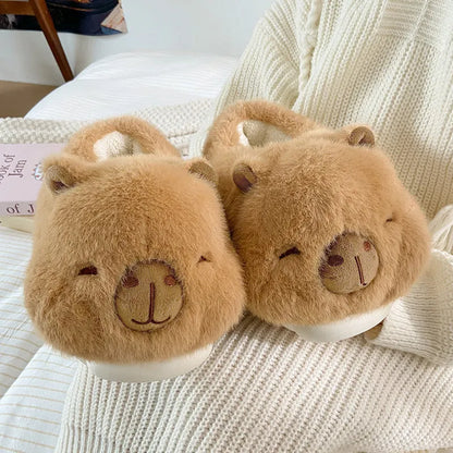 Light brown women's winter slippers with cartoon pattern, plush upper, and thick PVC sole