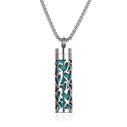 Titanium steel aromatherapy pendant with essential oil diffuser in various color options