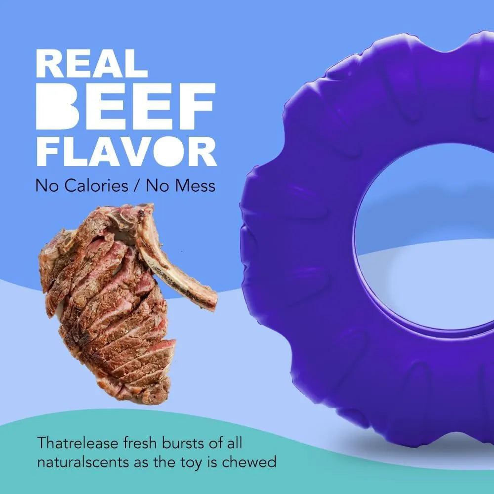 Blue tyre-shaped dog chew toy with oval openings, made from natural rubber for slow feeding