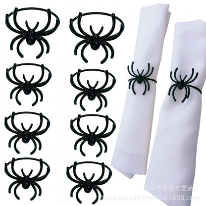Six black spider-shaped alloy napkin rings with electrophoresis coating for Halloween table settings
