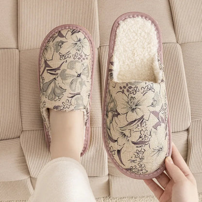 Pair of floral cotton slippers with linen-texture upper and light PVC sole for home wear.