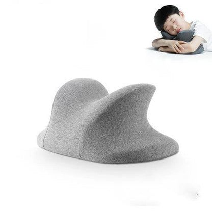 Ergonomic memory foam nap pillow with unique 'butterfly' shape design for comfortable desk or classroom power naps