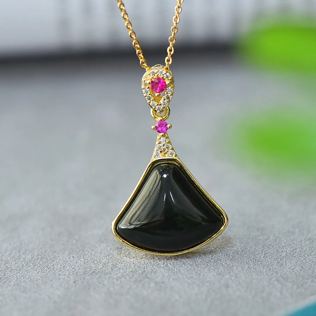Flat grey Hetian Jade pendant with ink blue jade details and copper inlay on a necklace chain