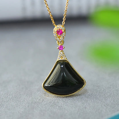 Flat grey Hetian Jade pendant with ink blue jade details and copper inlay on a necklace chain