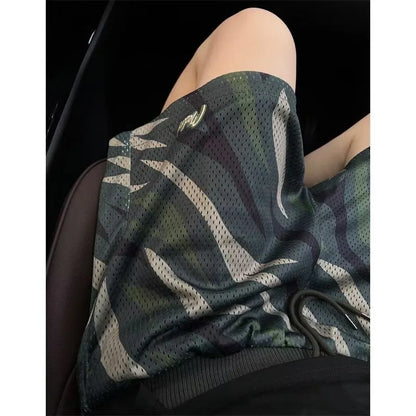 Men's straight-leg camouflage shorts in a cotton-polyester blend fabric on a neutral background.