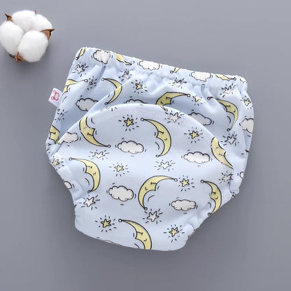 Washable baby training pants with 6-layer gauze construction in assorted patterns including animals and geometric designs