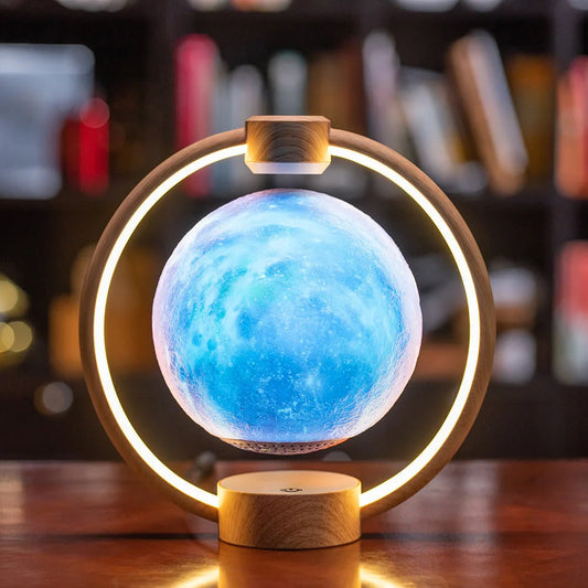 K1-Round Moon Bluetooth Speaker floating above wooden base with colorful lights