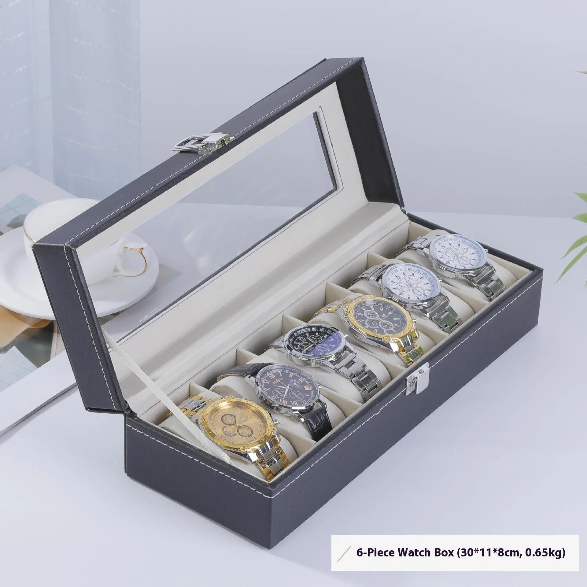 Grey high-grade leather watch storage box with transparent lid showing multiple watch compartments.