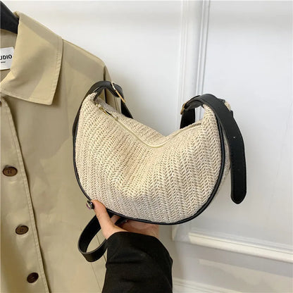 Women's woven straw crossbody bag with internal phone and file pockets in various colours.
