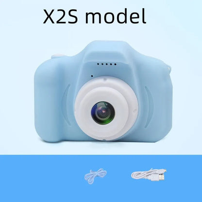 Colourful kids digital camera with silicone case showing 2-inch screen and lens.
