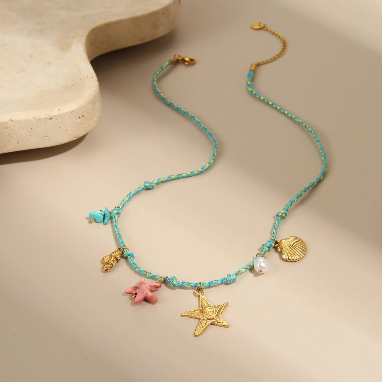 Handmade braided rope titanium steel necklace and bracelet with heart pendant on 18K gold plated chain.