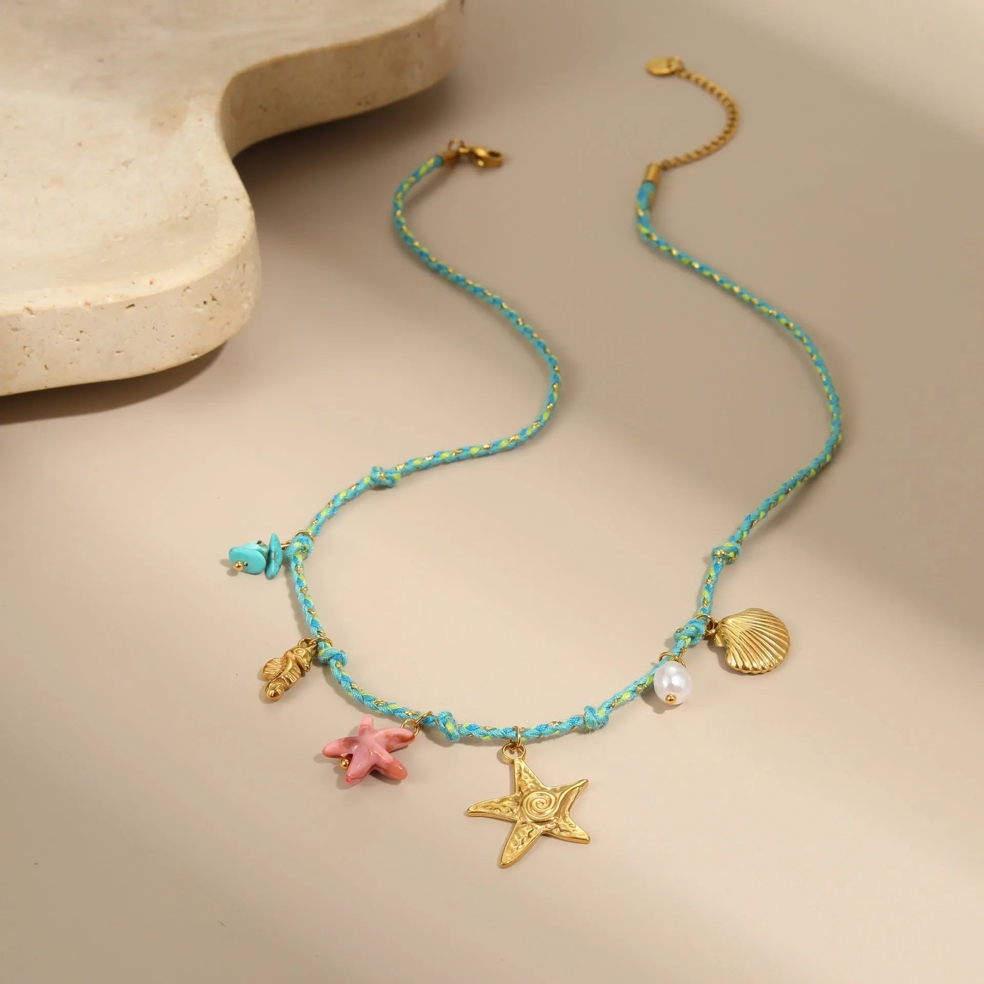 Handmade braided rope titanium steel necklace and bracelet with heart pendant on 18K gold plated chain.