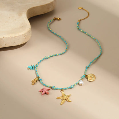 Handmade braided rope titanium steel necklace and bracelet with heart pendant on 18K gold plated chain.